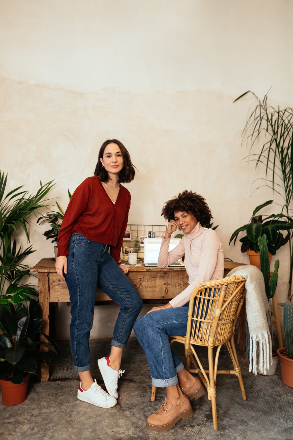 Portrait Of Casual Businesswomen In Office Full Of Plants.